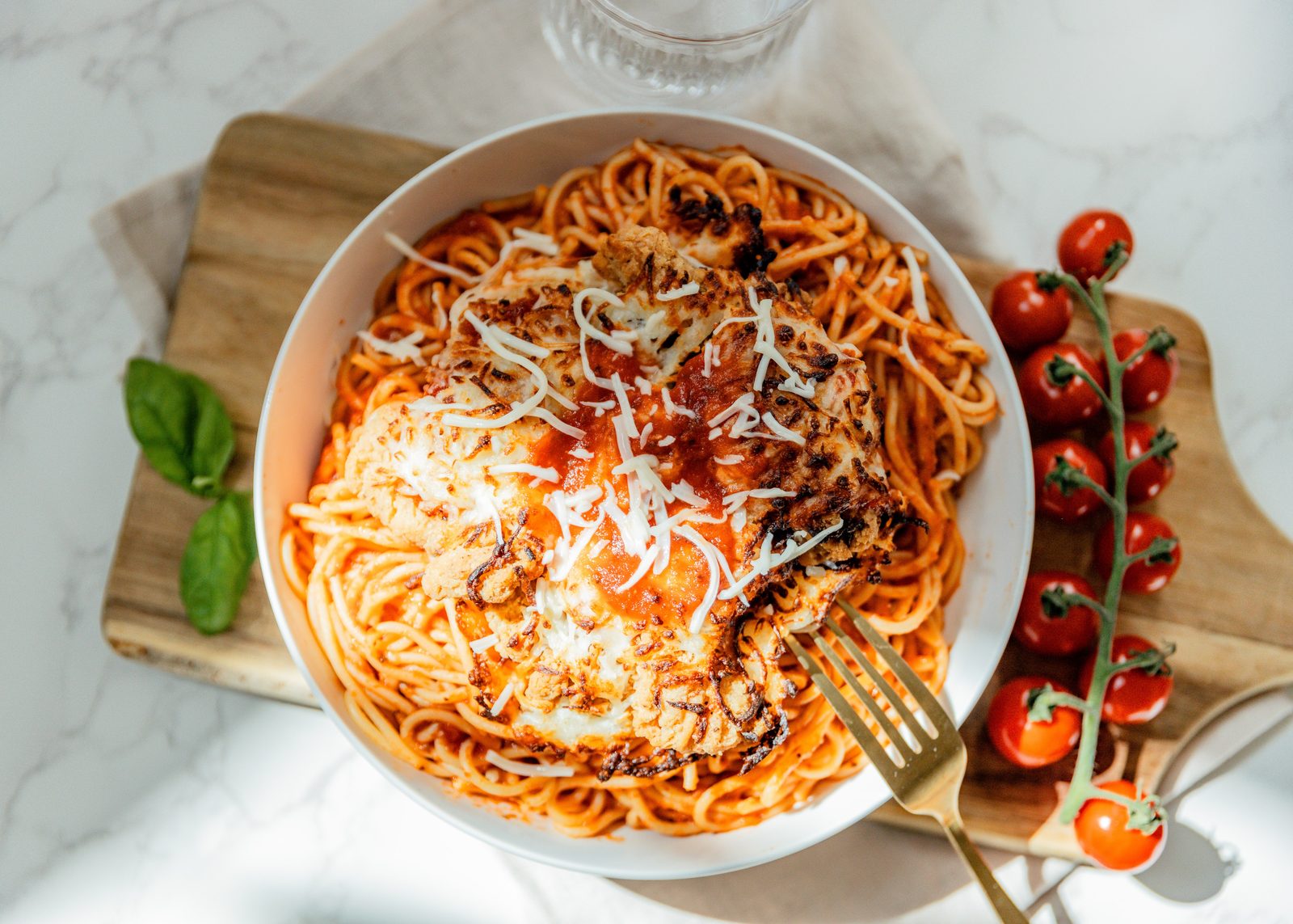 Pastaphony Long Beach — spaghetti chicken parmesan with marinara and shaved parmesan