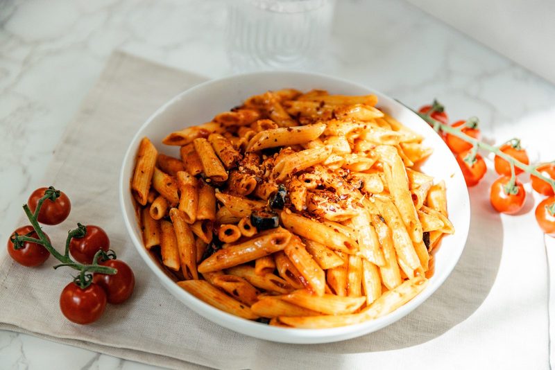 Penne Arrabbiata in red sauce with parmesan and cherry tomatoes