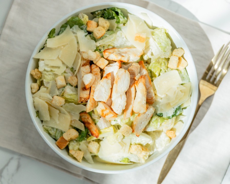 Caesar Salad — chopped romaine with croutons, shaved parmesan and Caesar dressing