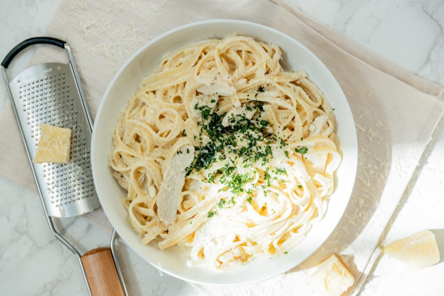 Fettuccine Chicken Alfredo — fettuccine in alfredo cream sauce with grilled chicken, parsley and parmesan