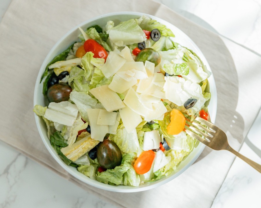 Italian Salad — chopped romaine with black olives, cherry tomatoes, onion and shaved parmesan