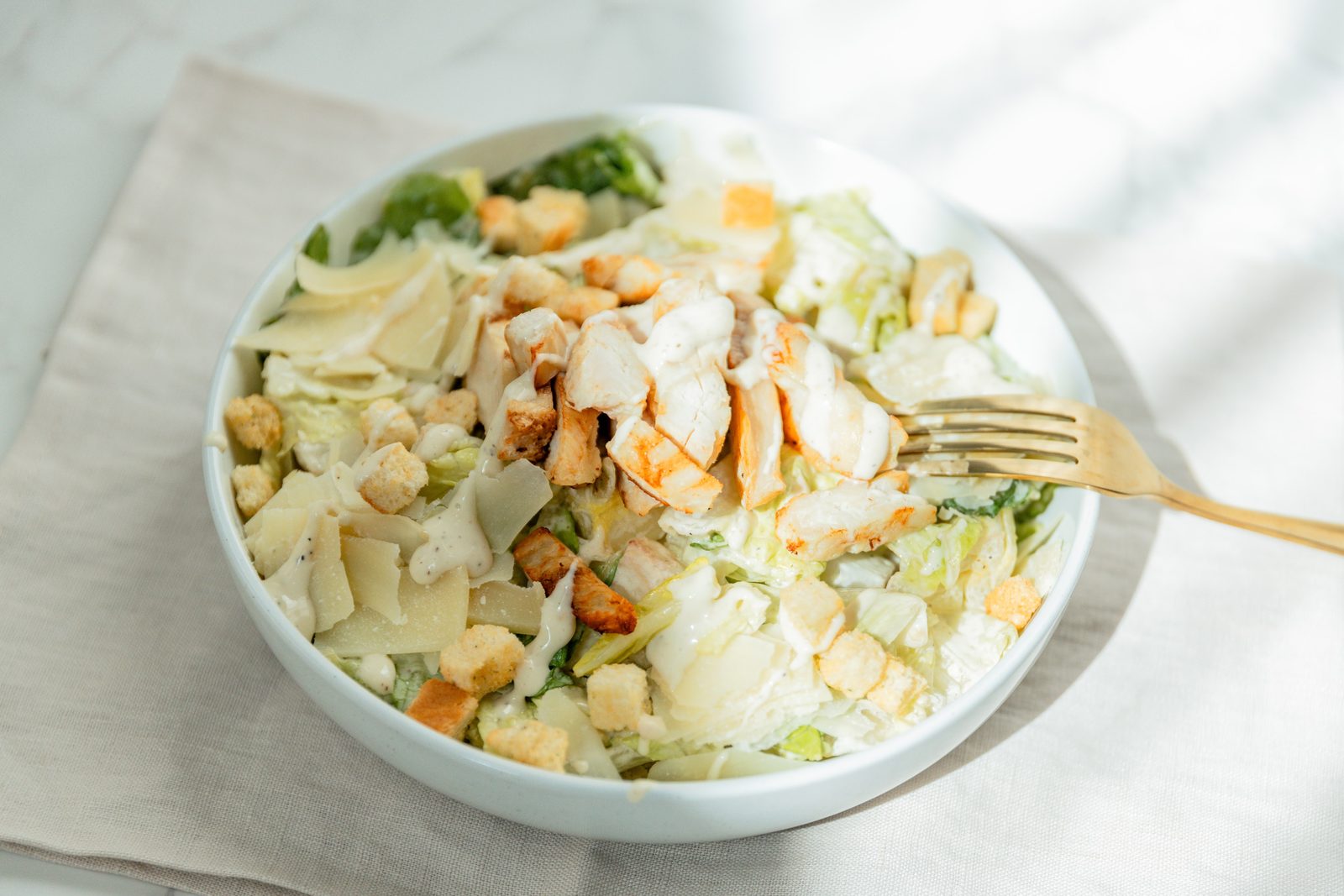 Pastaphony Tustin — chicken caesar salad with shaved parmesan and croutons